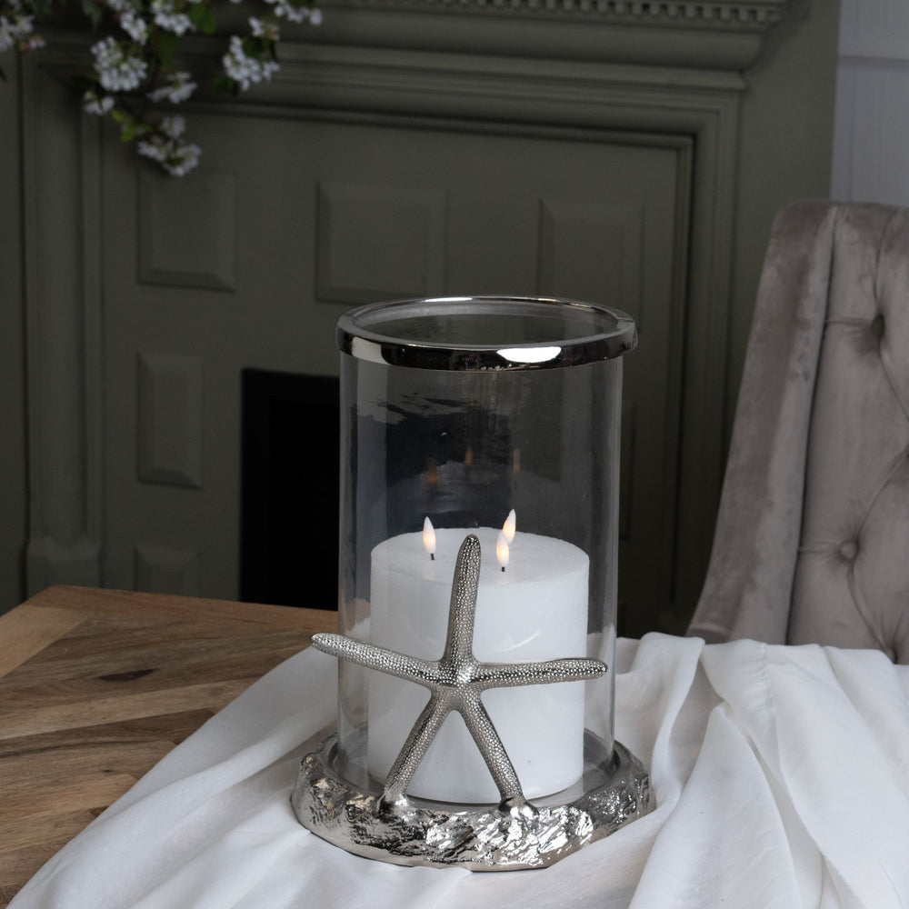 
                      
                        Silver Starfish Candle Hurricane Lantern
                      
                    