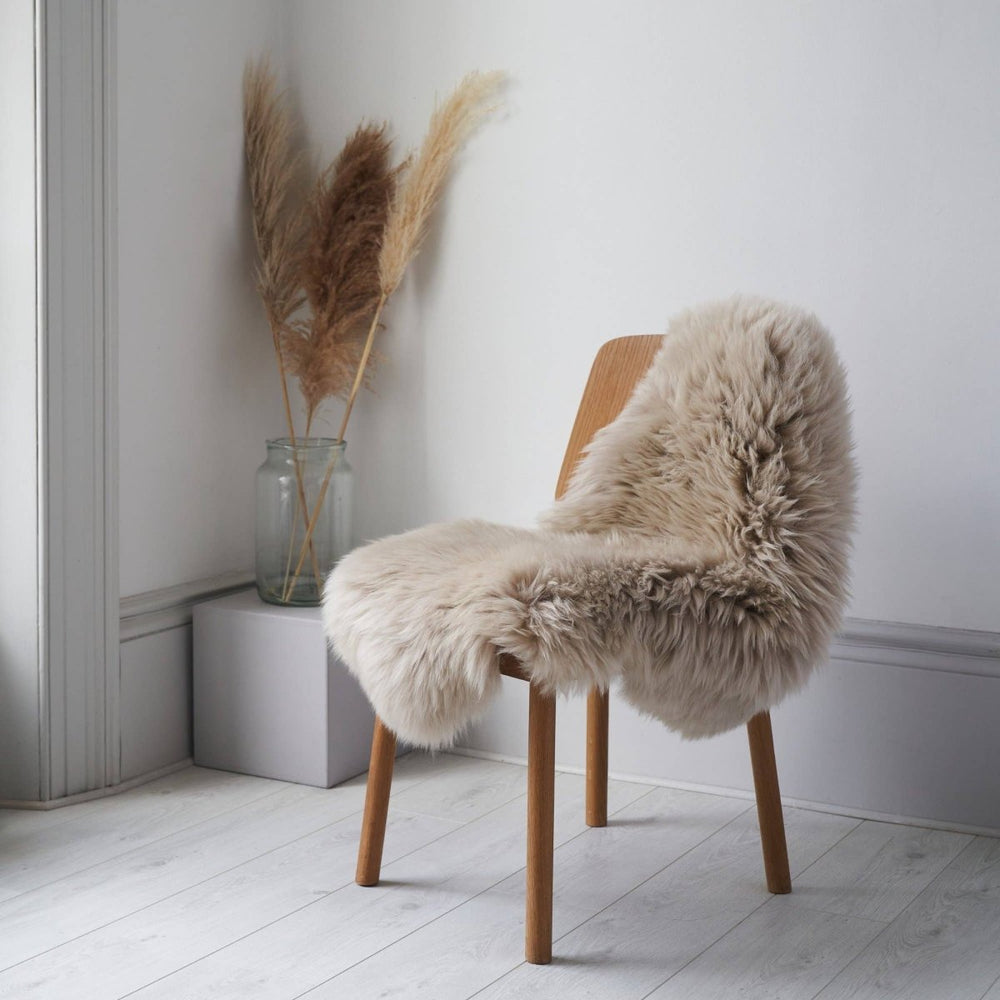 
                      
                        Ethically Crafted Sheepskin Rug in Oyster: Luxurious Comfort with a Conscience -
                      
                    